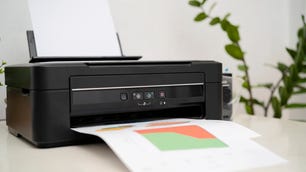 Black printer printing a colorful graph